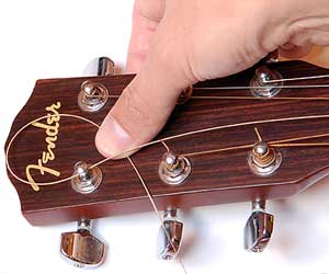 How to string a guitar